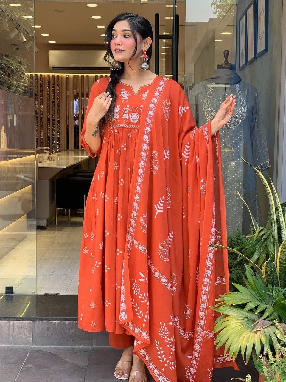 Tarani orange cotton kurti set closeup view highlighting fabric and embroidery