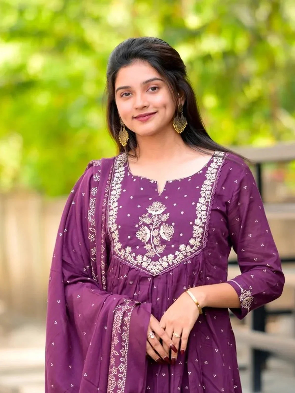 Tarani cotton embroidered dress in purple showing upper body design with neckline and sleeve detailing