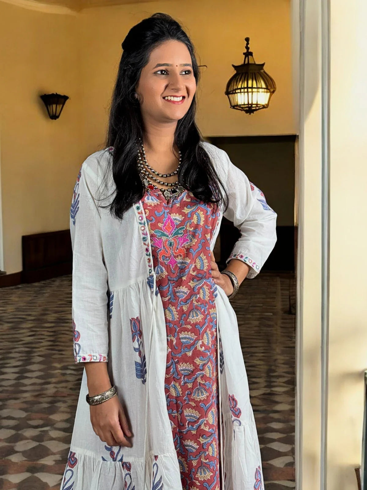 Tarani red cotton pant kurti and shrug set upper body view showcasing neckline and shrug detail