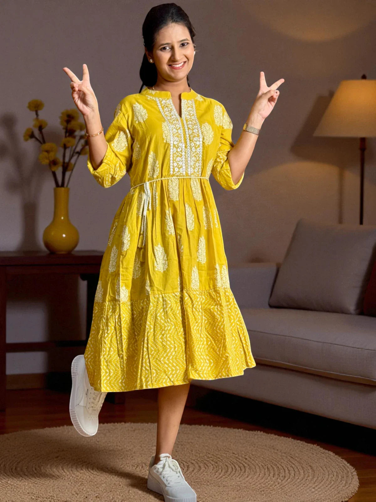 Tarani cotton midi dress in yellow with detailed front view and side pose
