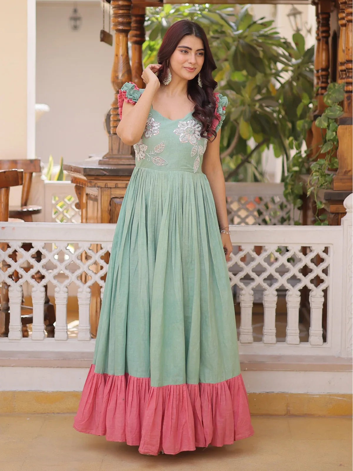 Tarani premium cotton embroidered gown in pastel green with soft pink border full view