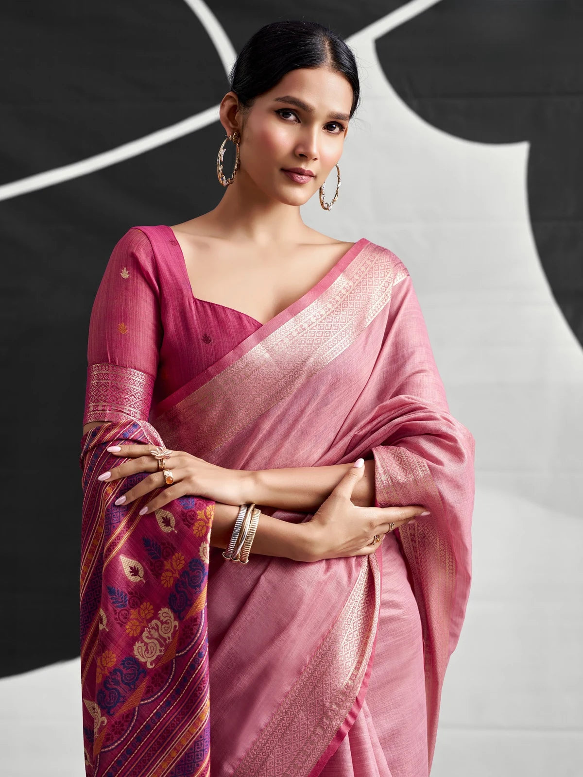 Tarani pink cotton modal saree upper body view highlighting woven border and blouse