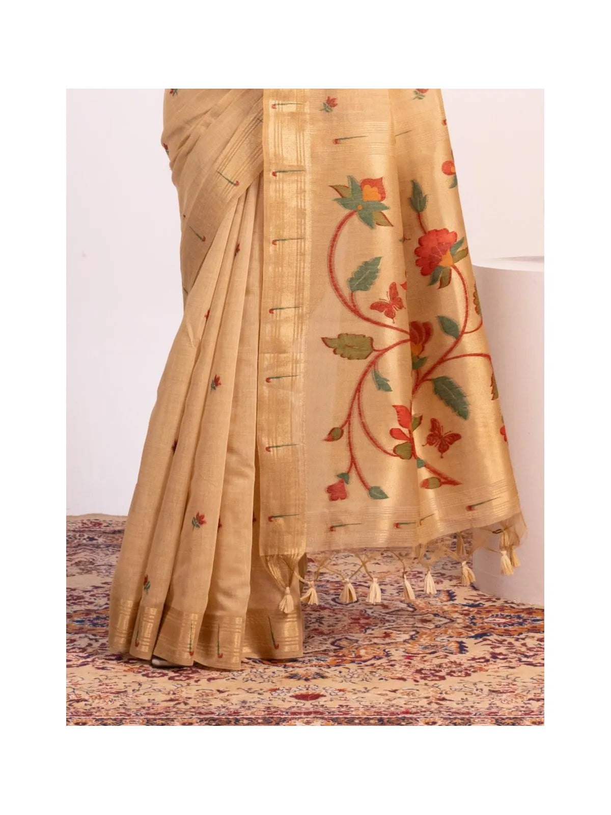 Tarani paithani saree beige pallu view with red green resham weaving and tassel finish