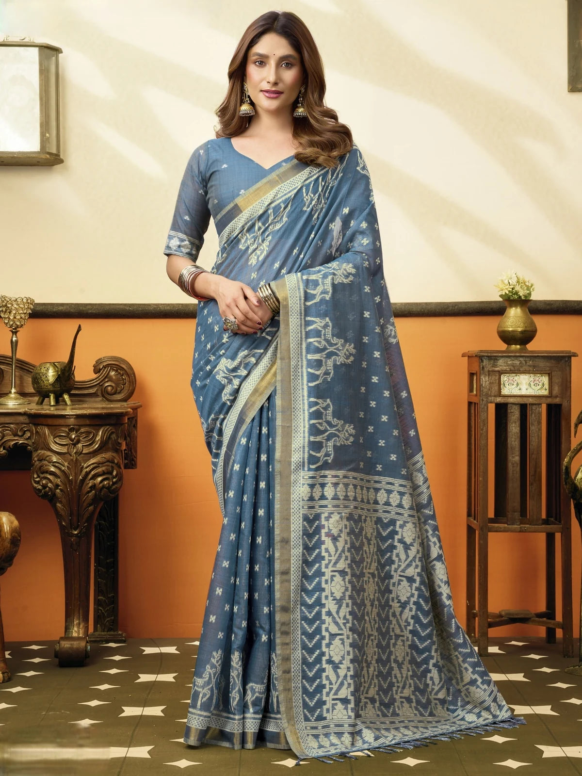 Tarani premium blue cotton saree full view with woven border and jhallar for festive wear
