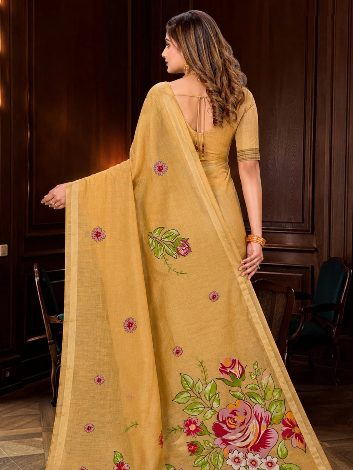 Tarani golden cotton blend saree back view showing floral pallu and blouse
