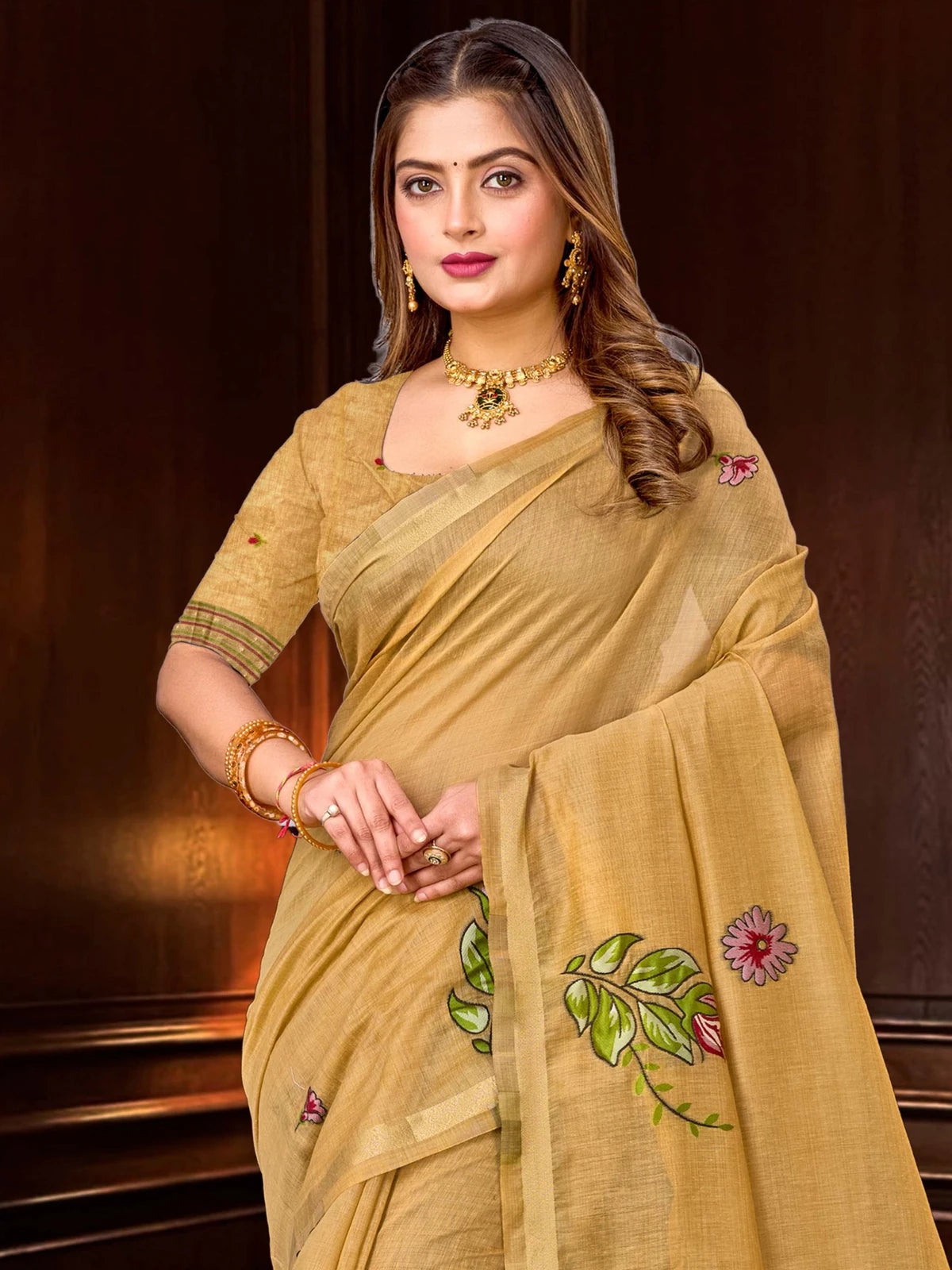 Tarani golden cotton blend saree upper body view with zari border and floral pallu