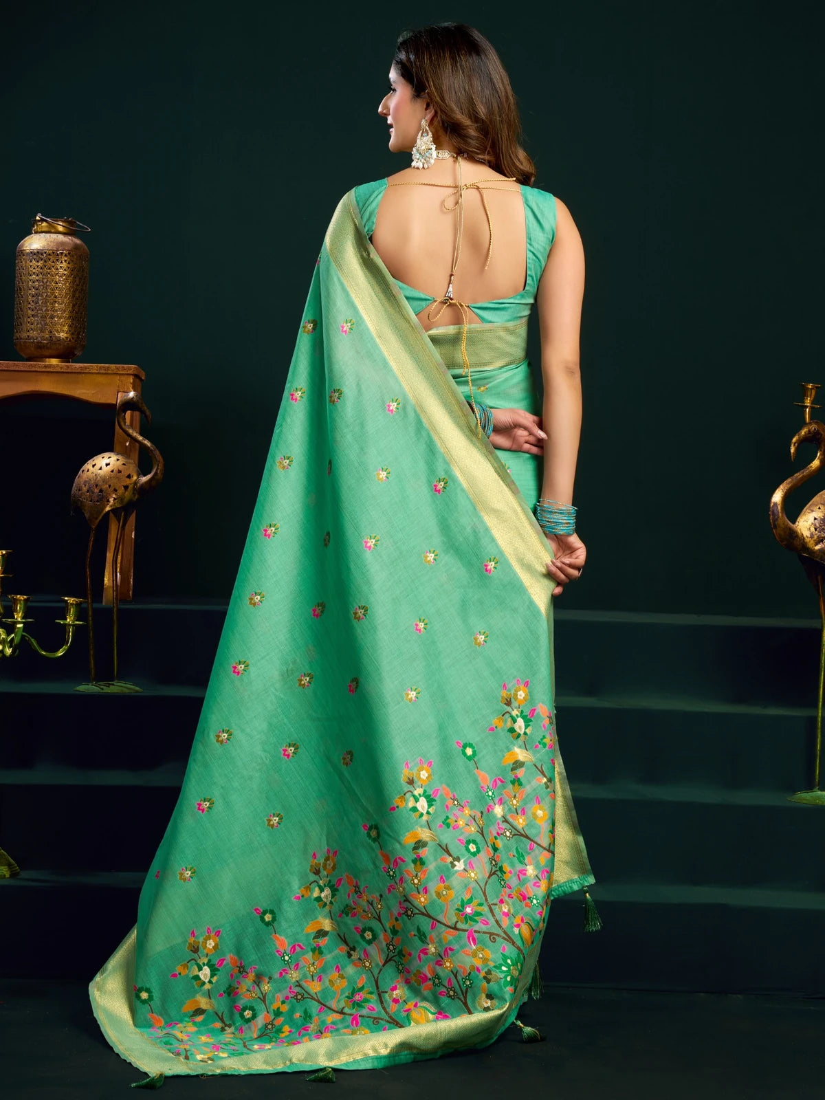 Tarani Aadarsha green Munga Cotton Mina Work saree back view with zari border and blouse