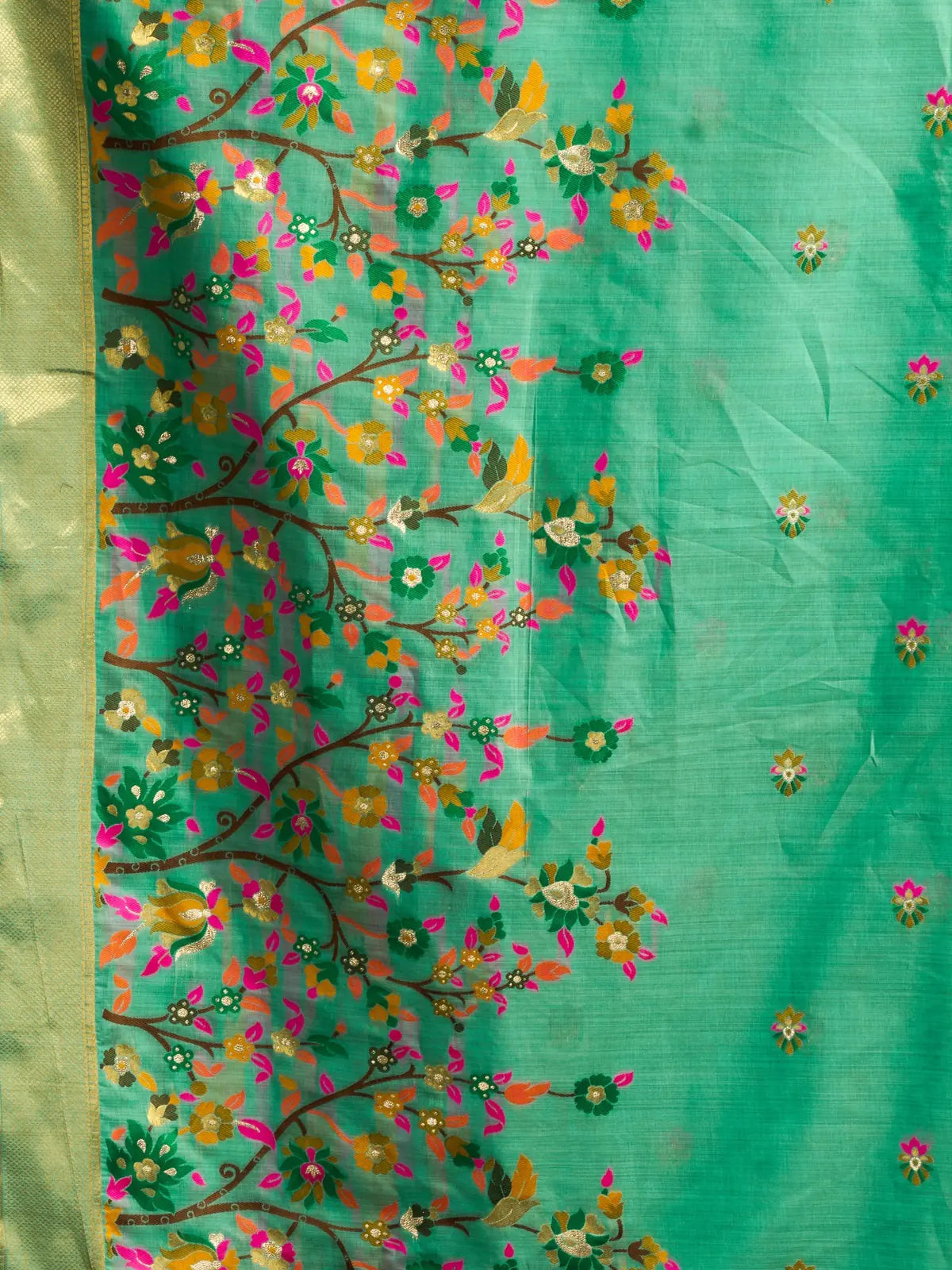 Tarani Aadarsha green saree closeup floral mina work zari detailing by Tarani