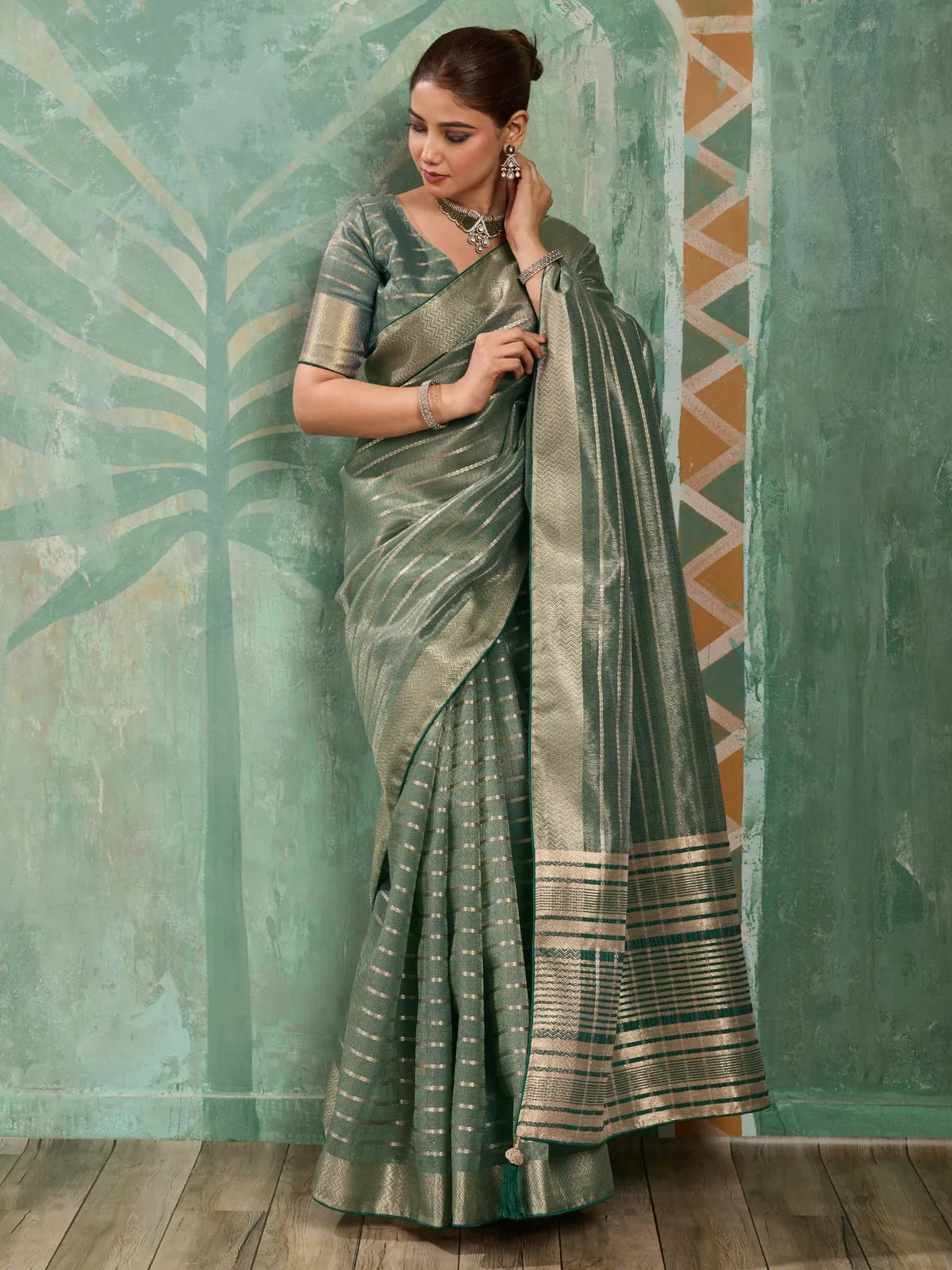 Tarani green cotton tissue saree with zari woven work front view