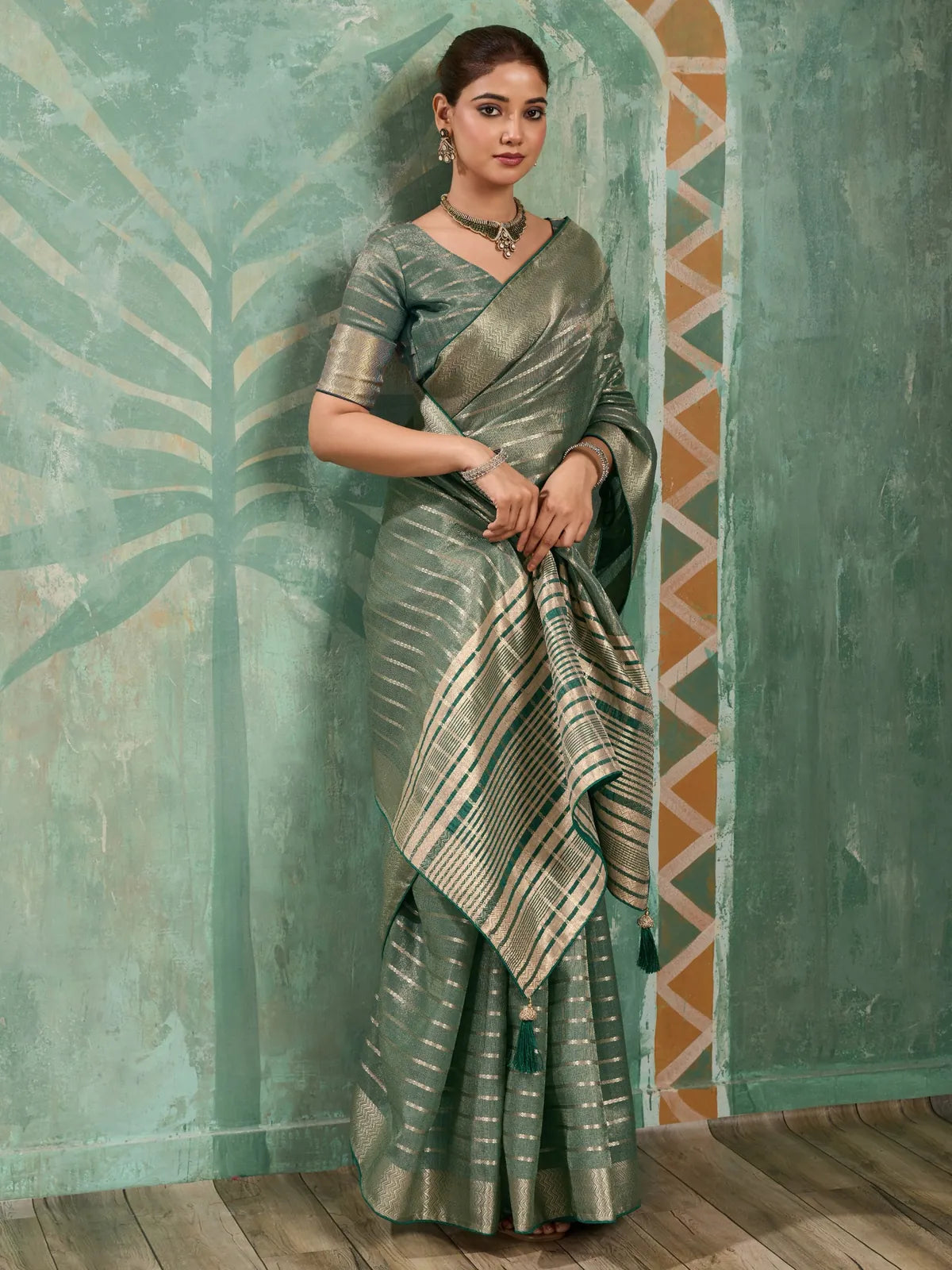 Tarani green cotton tissue saree with zari woven work front view
