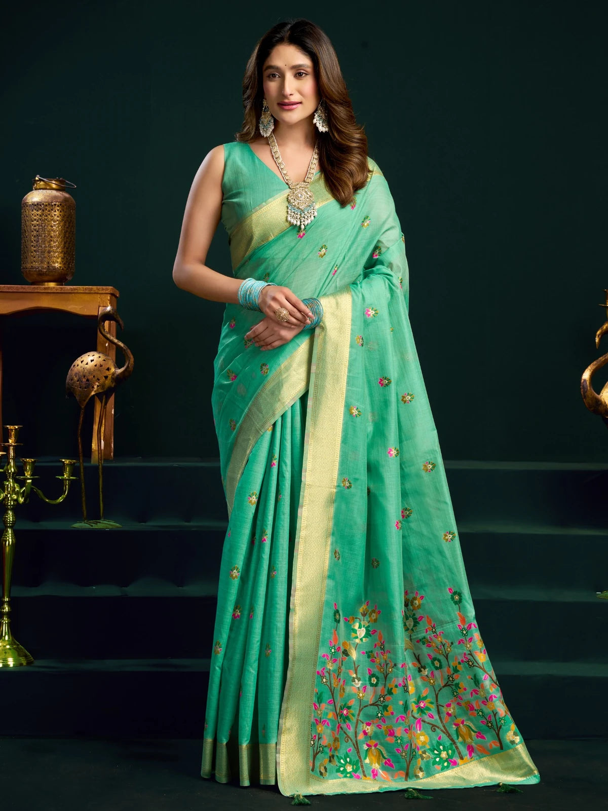 Tarani Aadarsha green Munga Cotton Mina Work saree with zari border floral pallu full front view