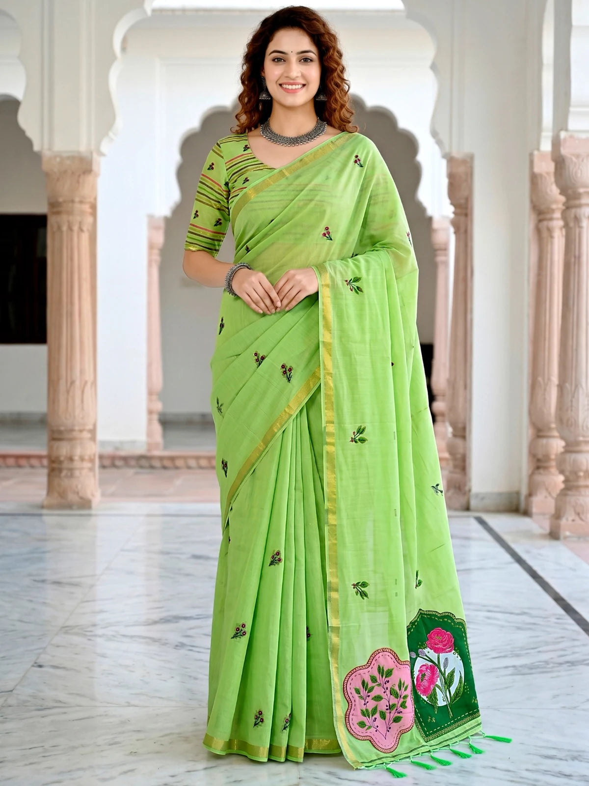 Tarani Nistha green cotton saree with woven floral work and contrast border full front view