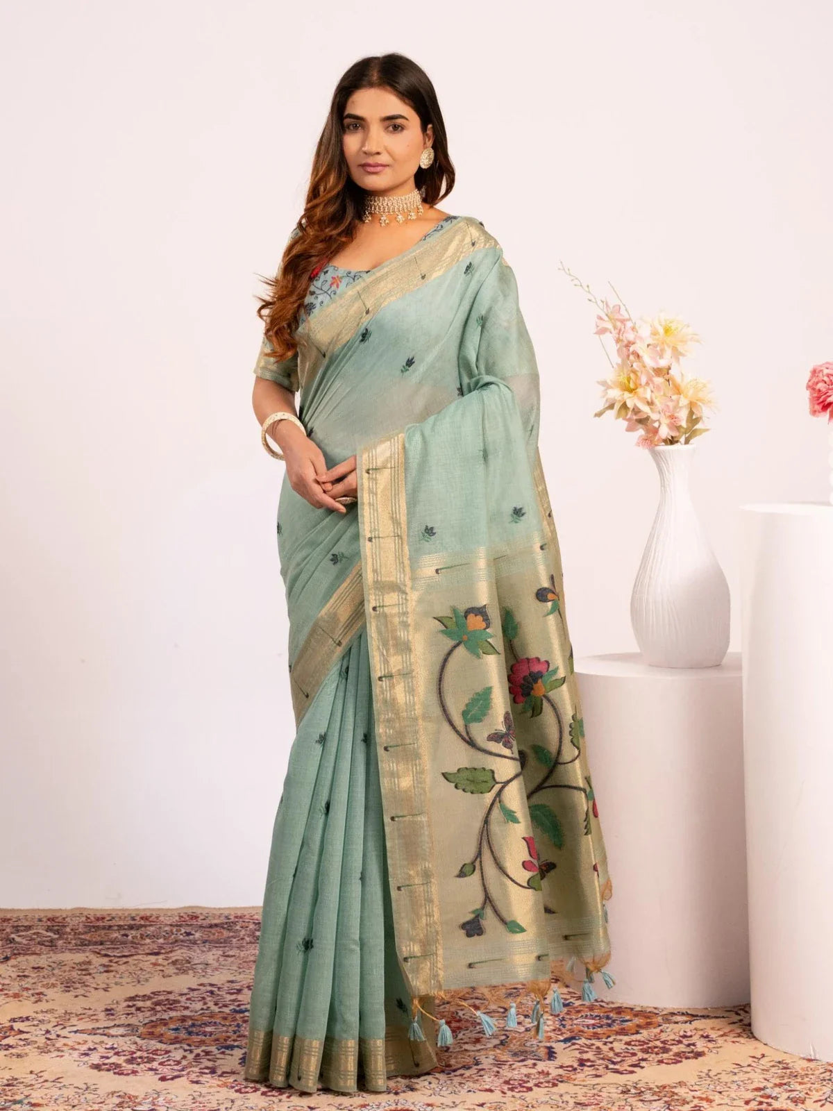 Tarani premium green cotton paithani saree with floral resham pallu and zari muniya border