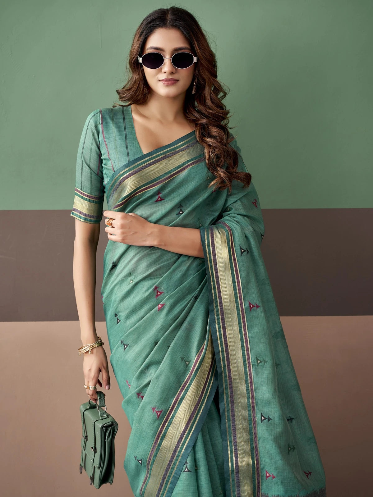 Tarani Vedanti pallu and border detail of green cotton weaving saree