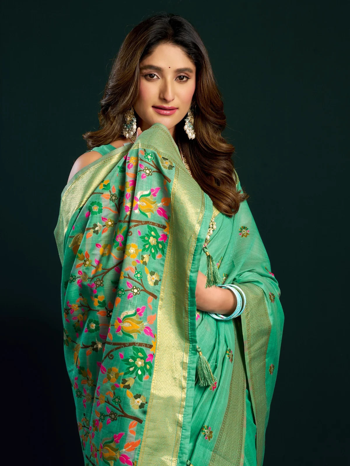 Tarani Aadarsha green saree pallu view with floral mina work and zari border by Tarani