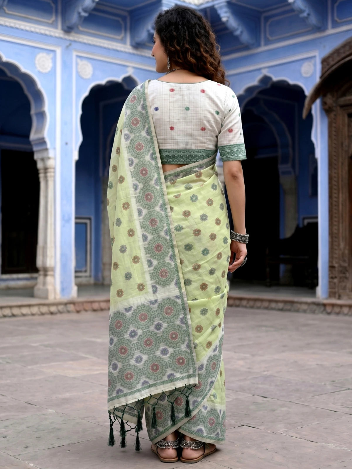 Tarani light green cotton printed saree with blouse piece back view Gopika