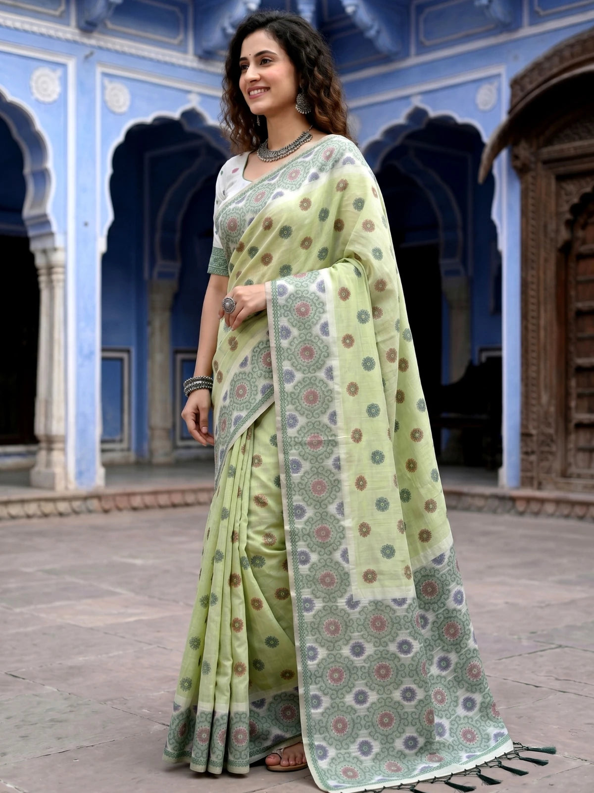 Tarani light green cotton printed saree with blouse piece side view Gopika