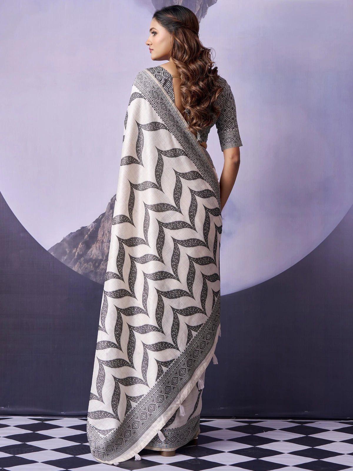 Tarani premium off white cotton saree with black printed design back view