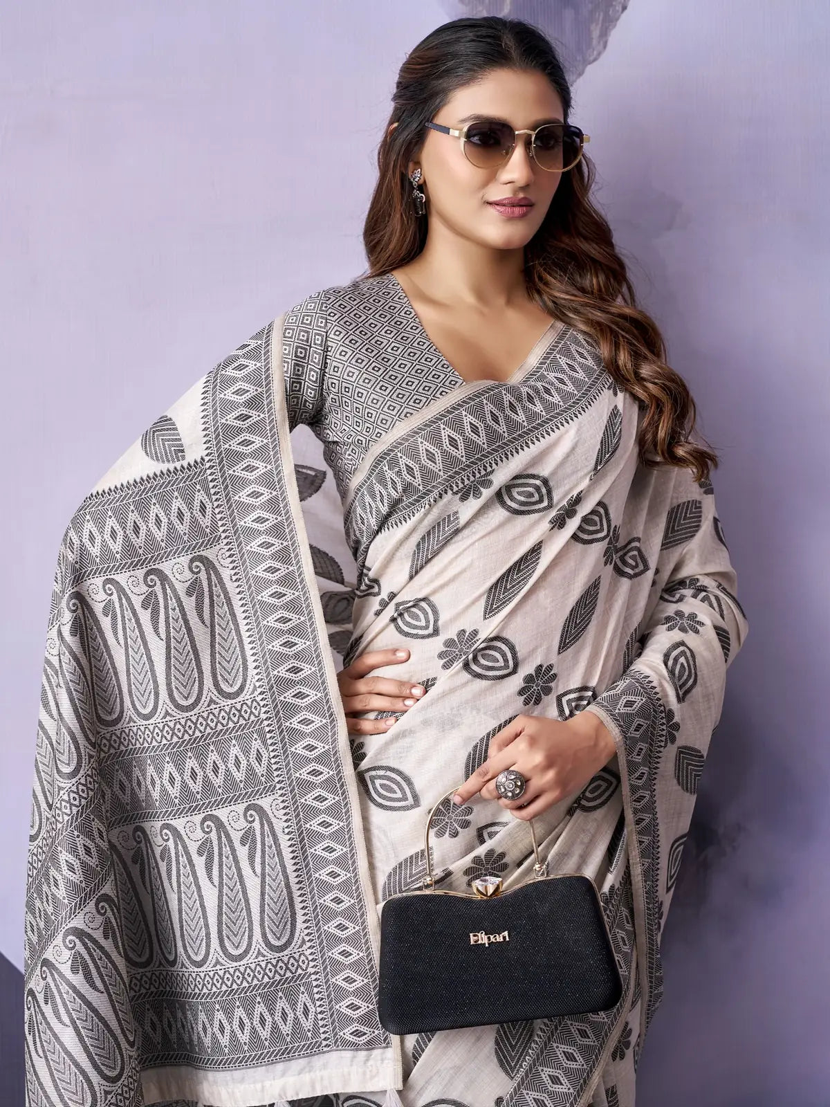 Tarani off white Fancy Premium Cotton saree with woven border and cotton blouse closeup-view