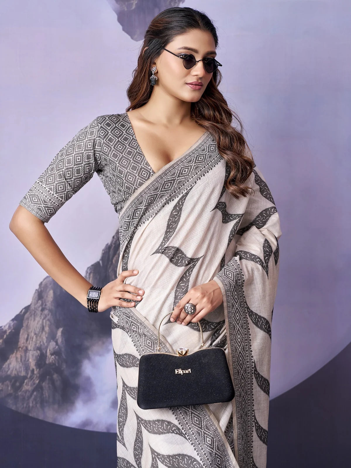 Tarani premium off white cotton saree with black printed design closeup view