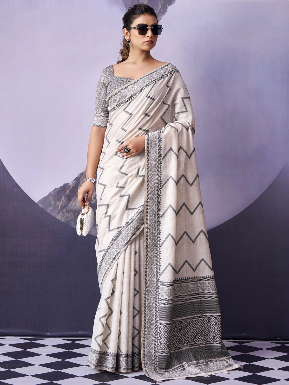 Tarani off white Fancy Premium Cotton saree full view with woven border and matching cotton blouse