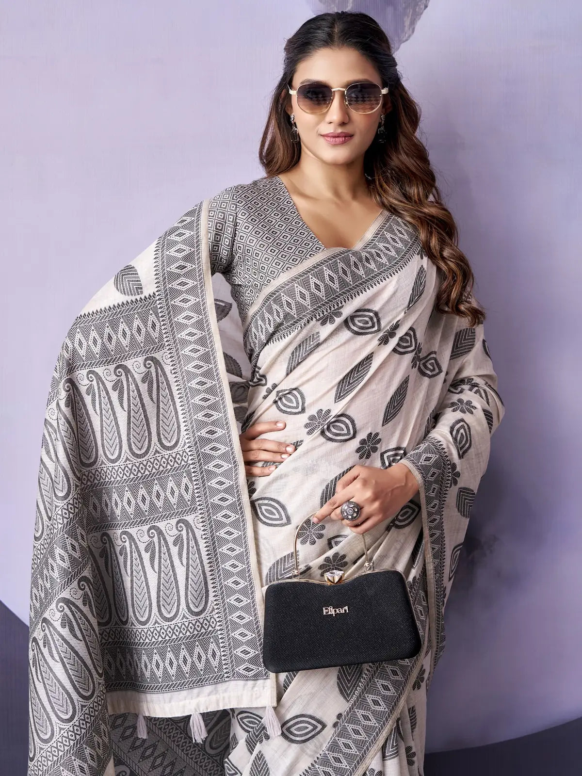 Tarani off white Fancy Premium Cotton saree with woven border and cotton blouse upper-body-view