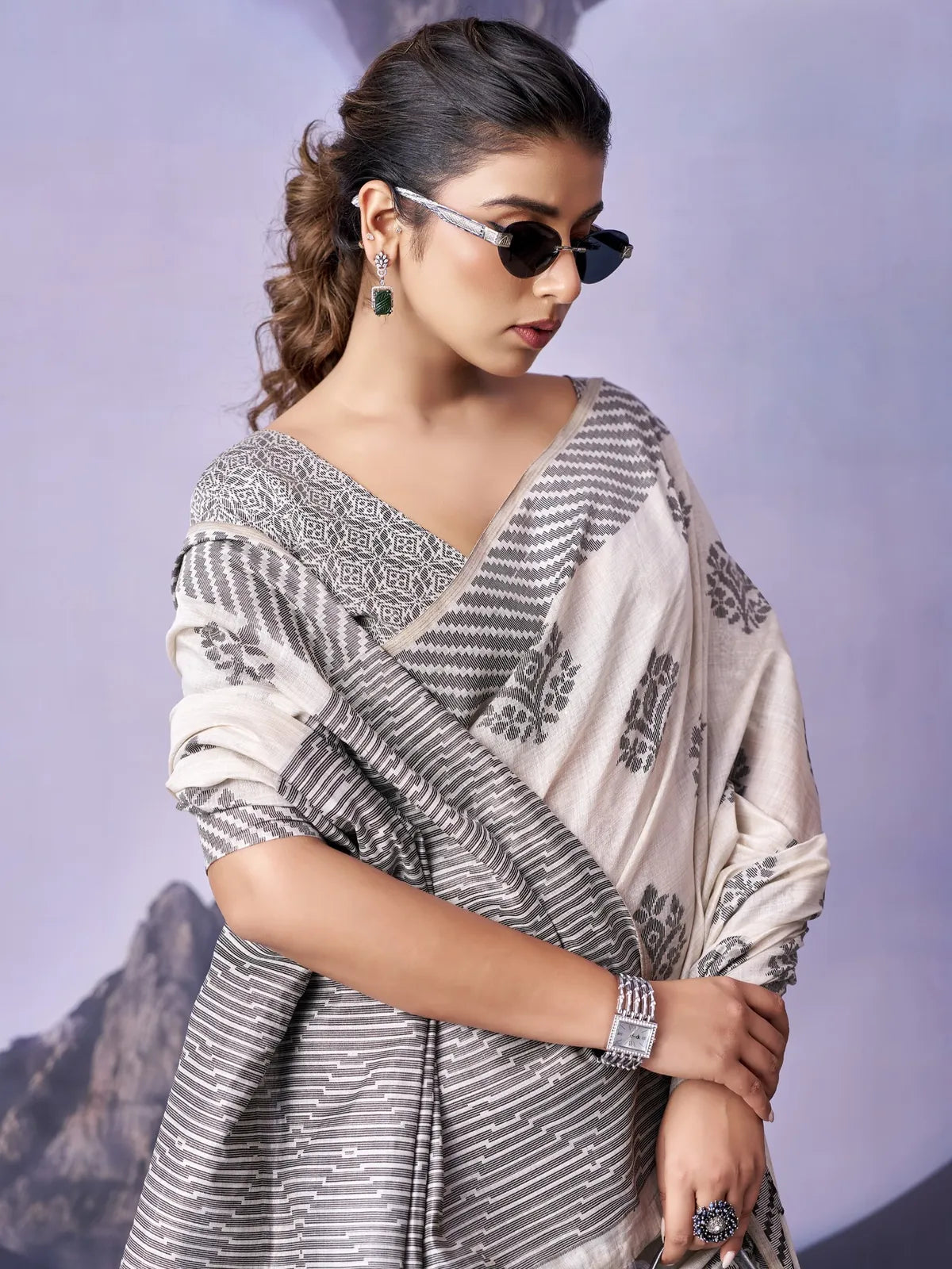 Tarani off white fancy premium cotton saree upper body view showing border and blouse