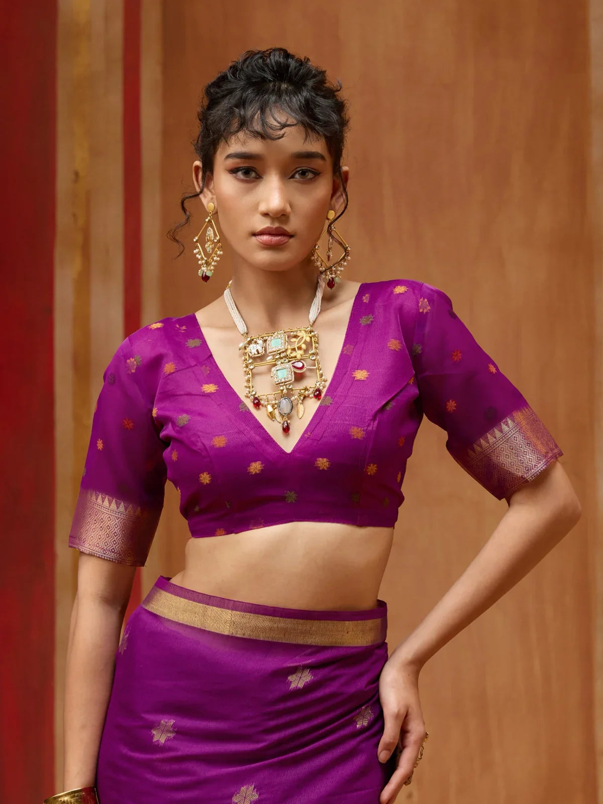 Tarani purple cotton saree blouse with zari work and deep V neckline close-up view
