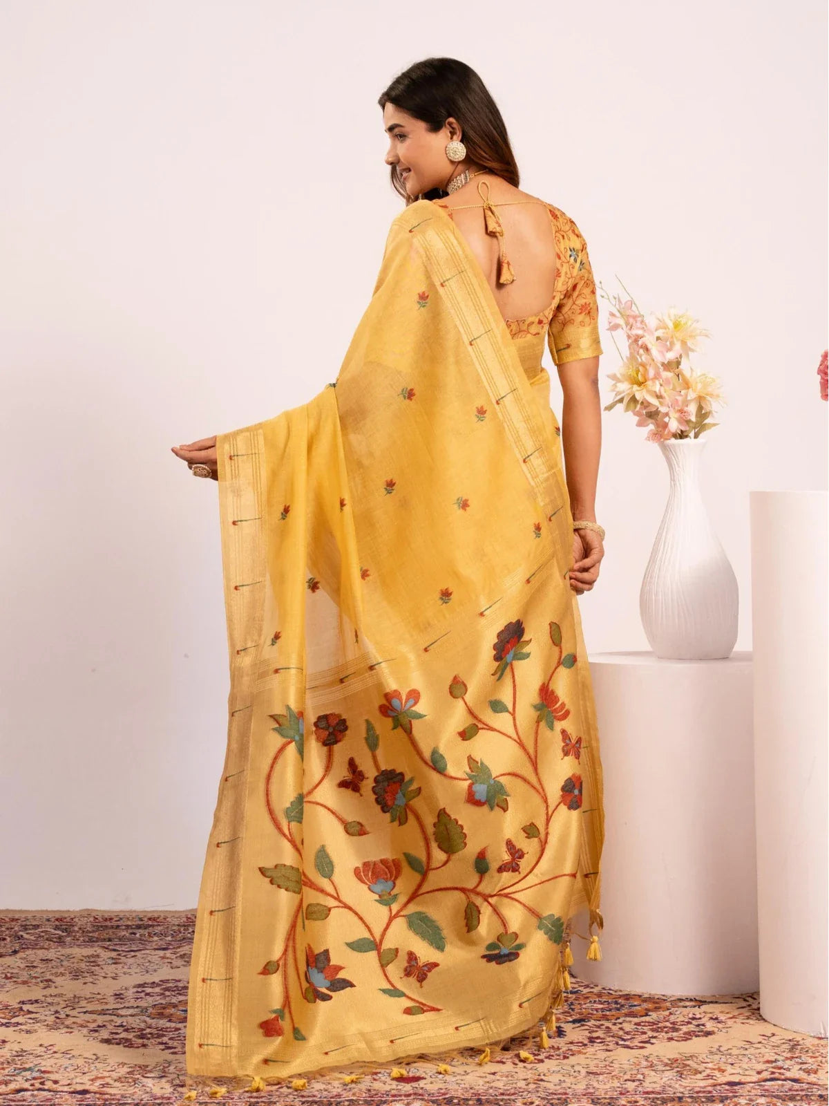 Tarani yellow paithani cotton saree back view showing detailed blouse and drape