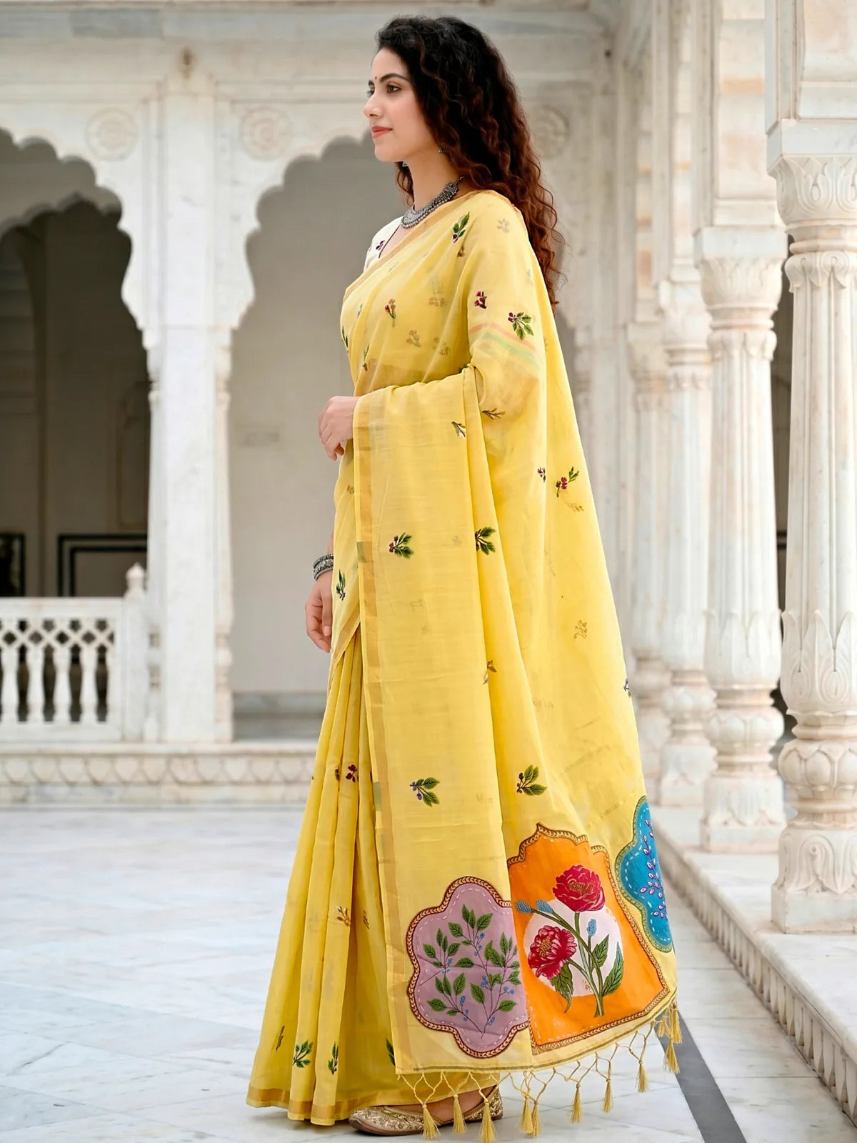 Tarani yellow cotton saree with woven floral work side-view Ramya
