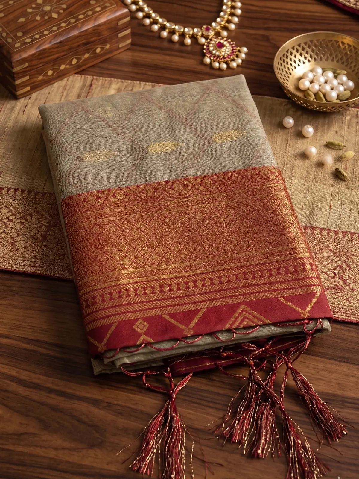 Tarani beige cotton silk saree with rich brown zari pallu and border closeup view