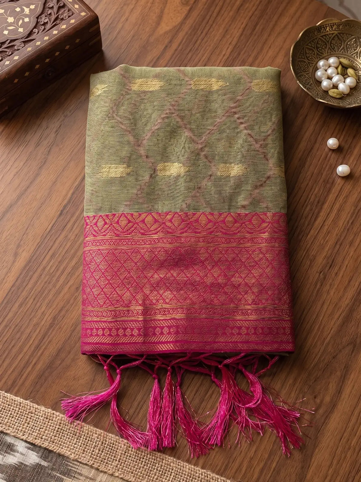 Tarani beige and pink cotton silk saree closeup view with rich zari border and woven detailing