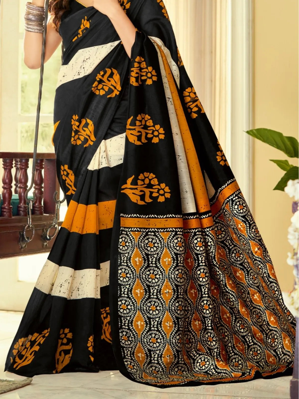 Tarani black cotton silk saree close-up view showing detailed border and soft texture