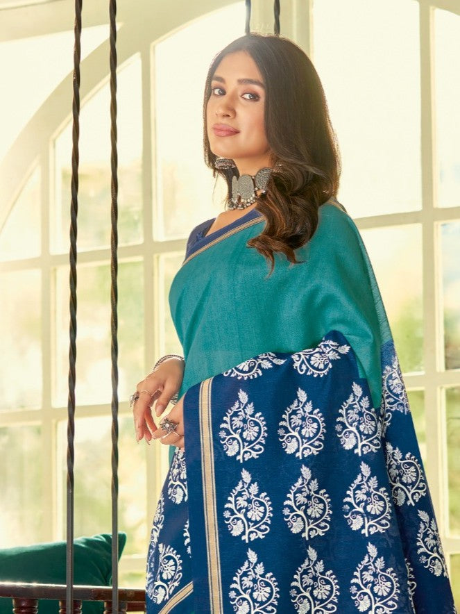 Tarani cotton silk saree upper body view highlighting teal blue pallu and elegant design