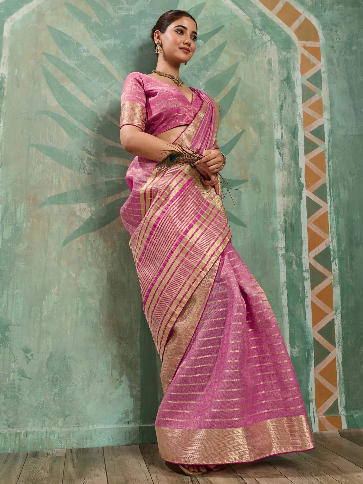 Tarani pink cotton tissue saree side view highlighting broad patta