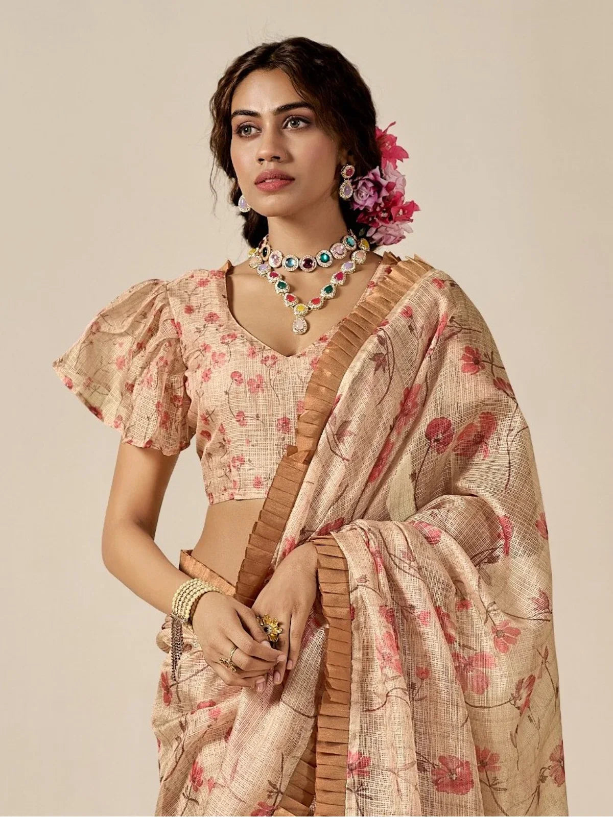 Tarani beige cotton blend saree upper-body view showing floral blouse and festive look