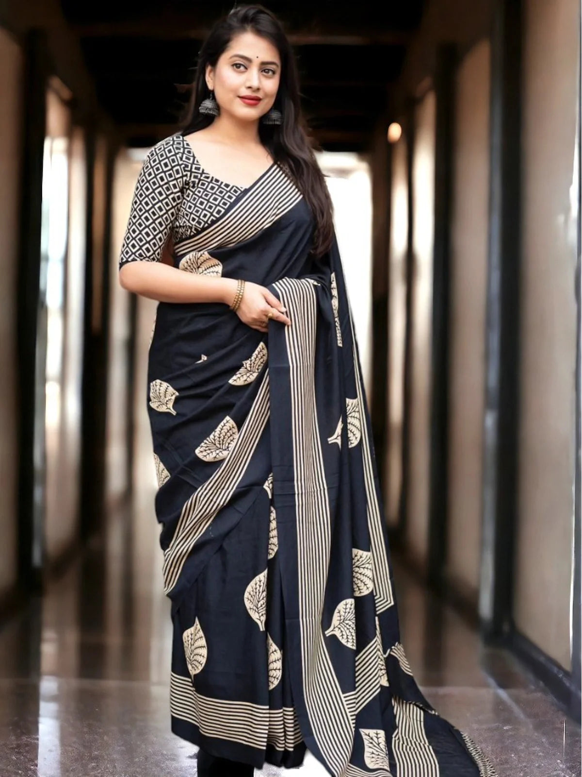 Tarani black cotton blend saree with silk blend blouse, elegant traditional wear for festive occasions
