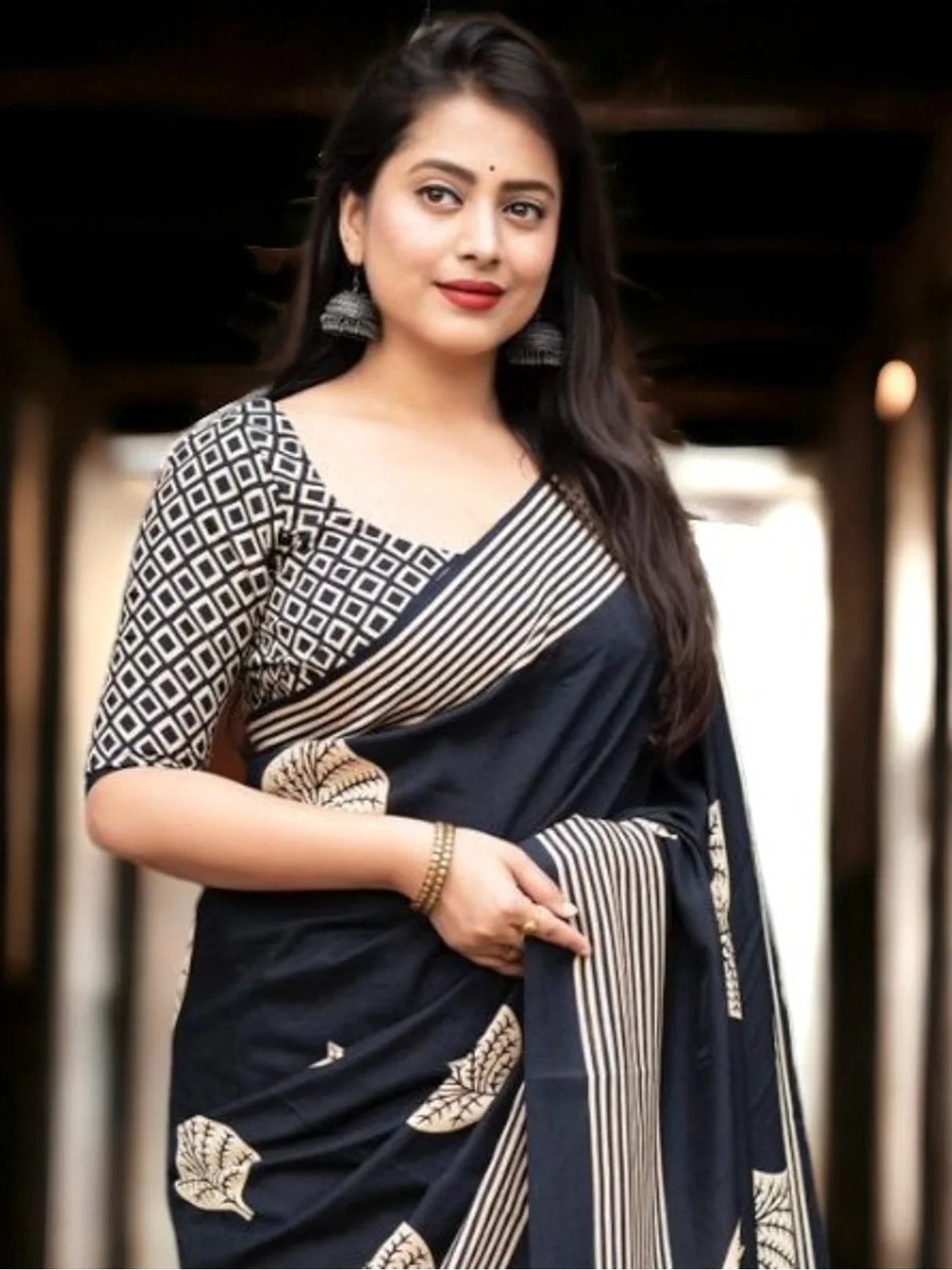 Tarani cotton blend black saree upper body view showing elegant blouse design