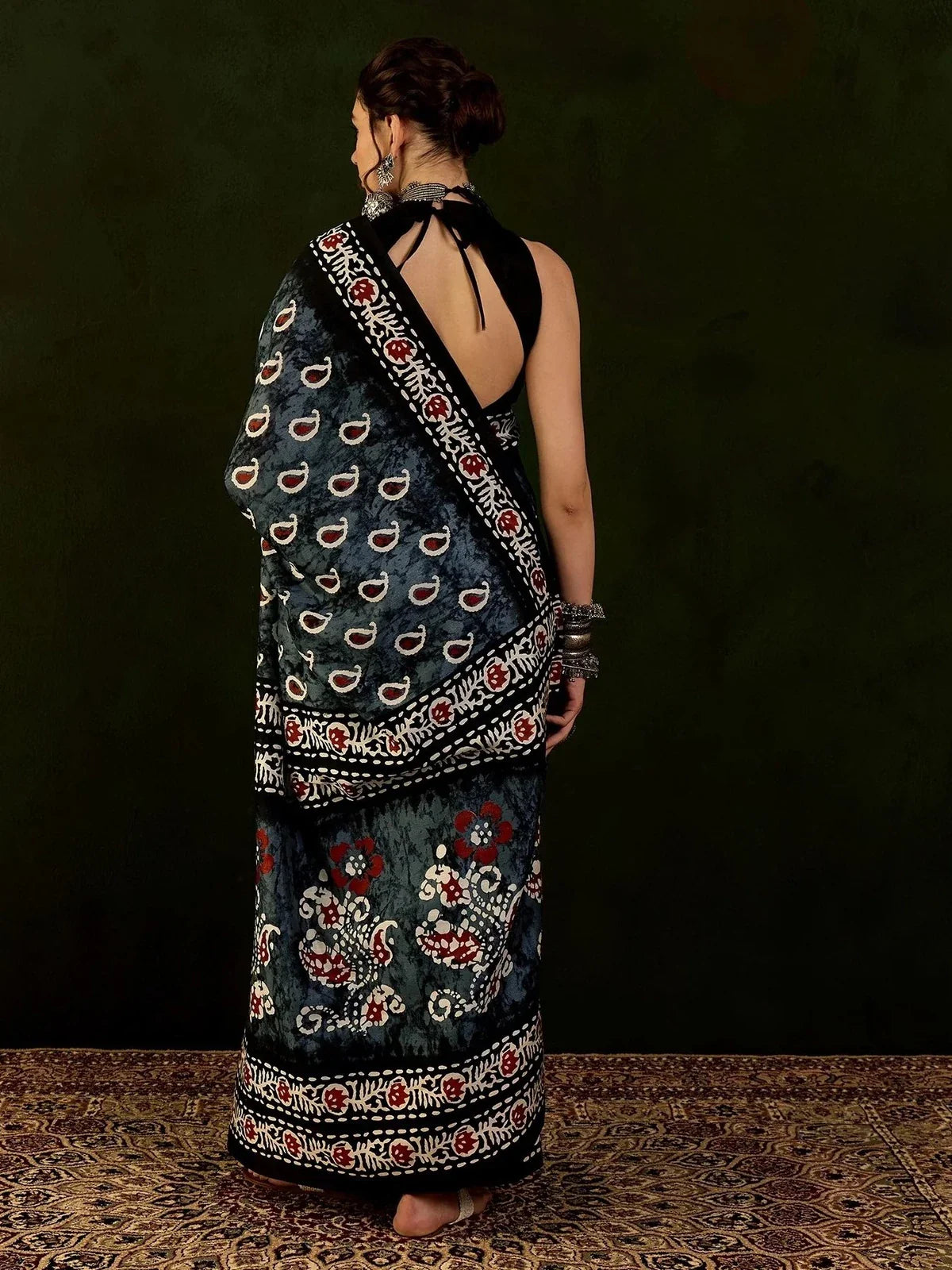 Tarani blue cotton crape saree back view with elegant drape and traditional border