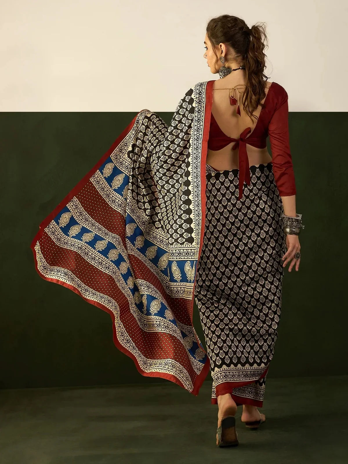 Tarani cotton silk saree black back-view showcasing elegant pallu and blouse design