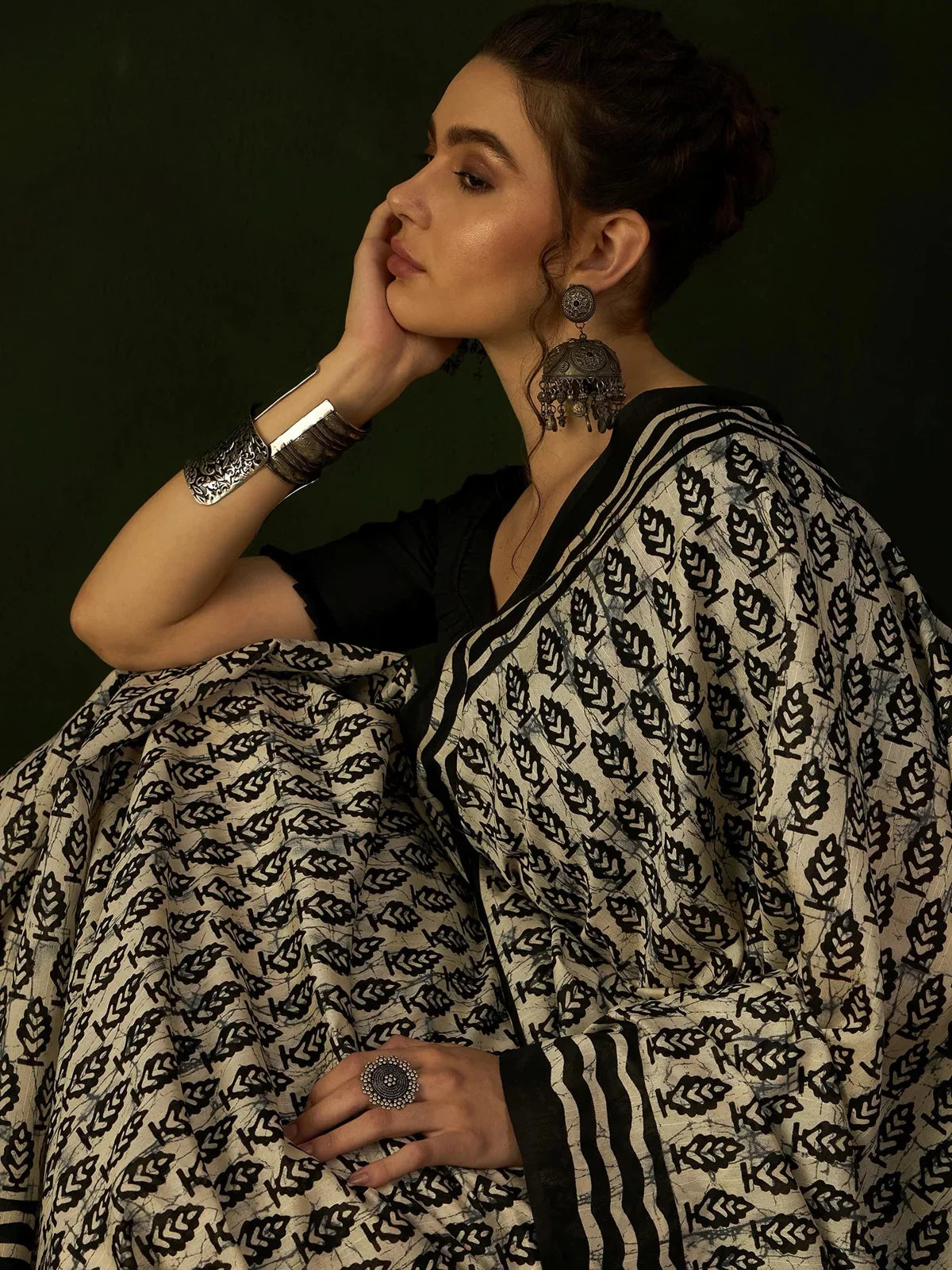 Tarani black and white cotton silk saree upper body closeup view with elegant batik print