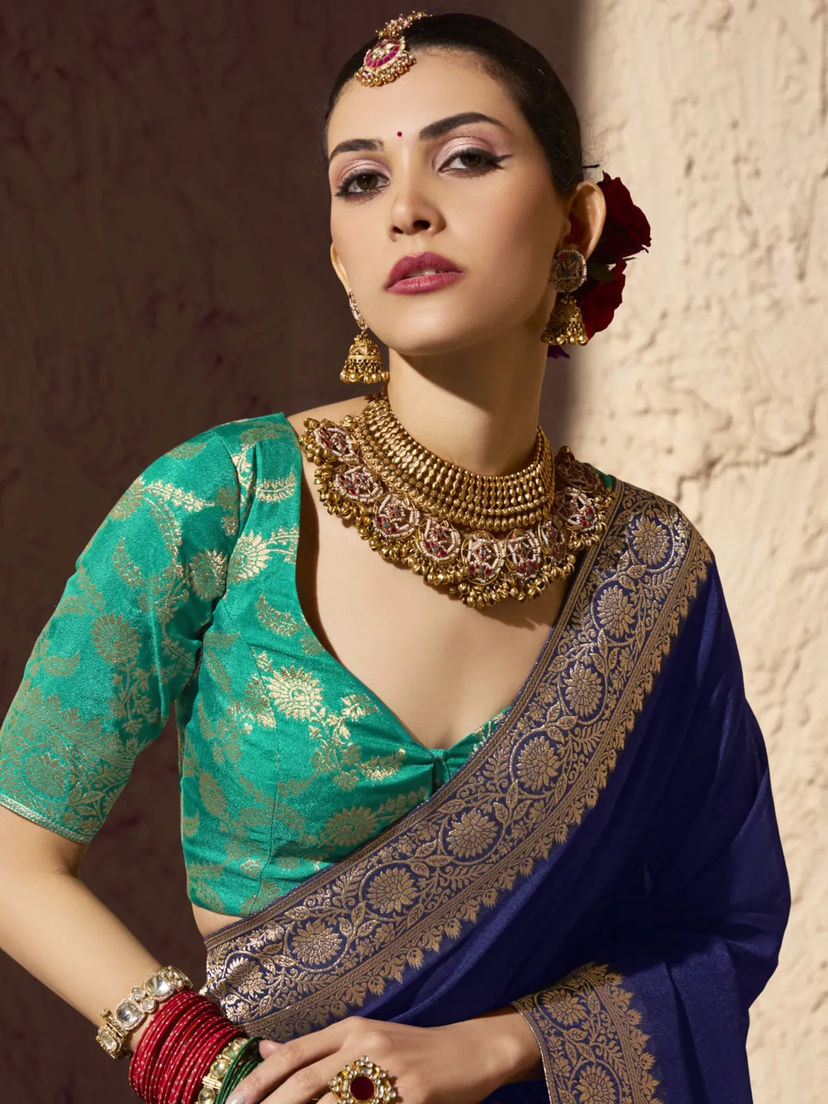 Tarani navy blue zari woven saree with traditional jewelry - upper body closeup