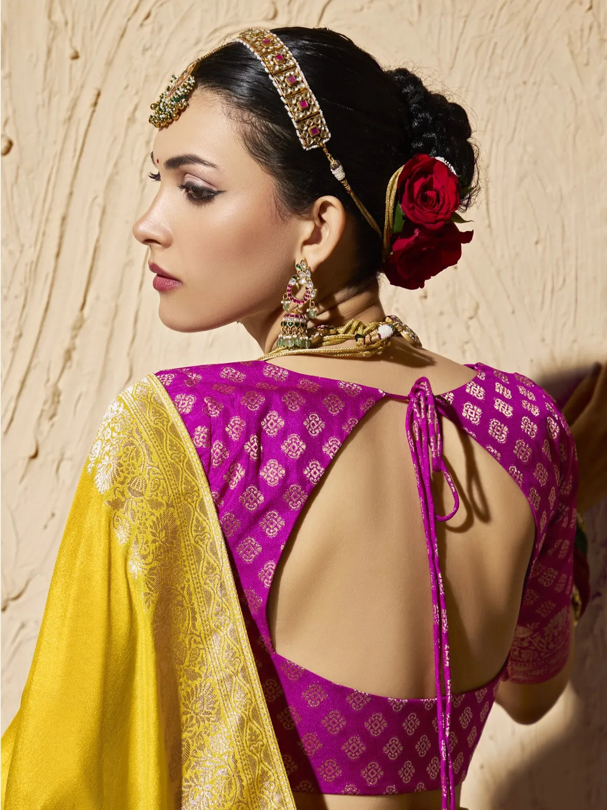 Tarani festive saree back blouse view with contrast color and open-back tie design