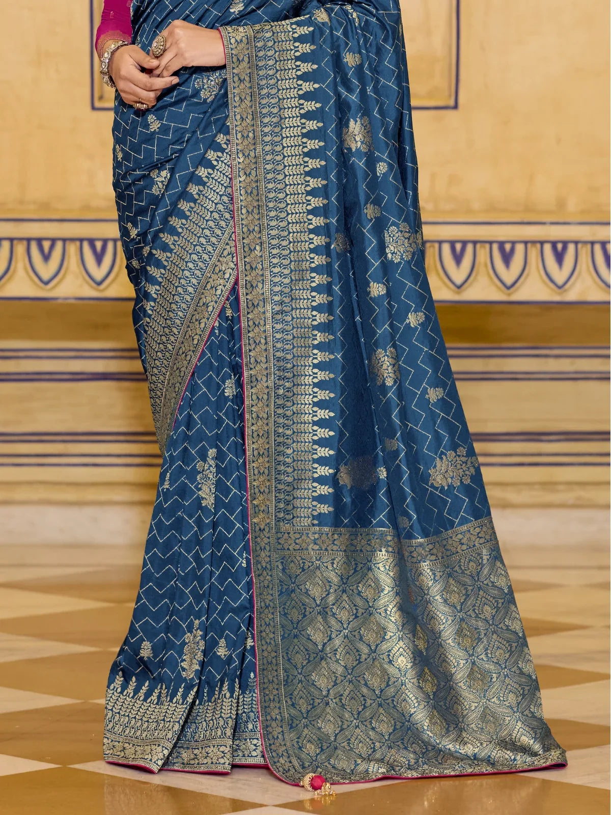 Tarani blue crepe silk saree close view of pallu and border with intricate zari design