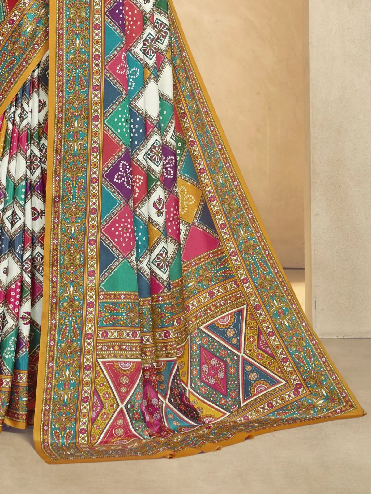 Tarani saree closeup of pallu showing colorful foil digital print and border work