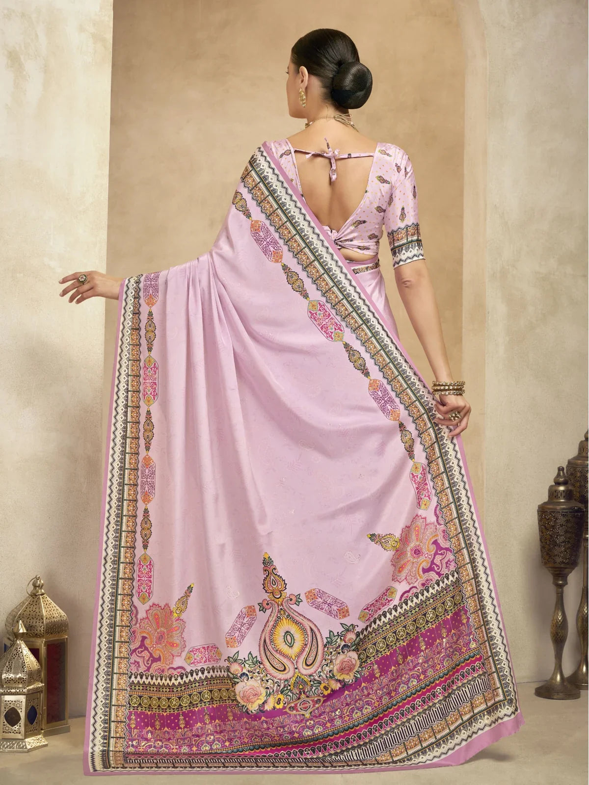 Tarani pink crepe saree back view showing blouse tie detail and pallu fall