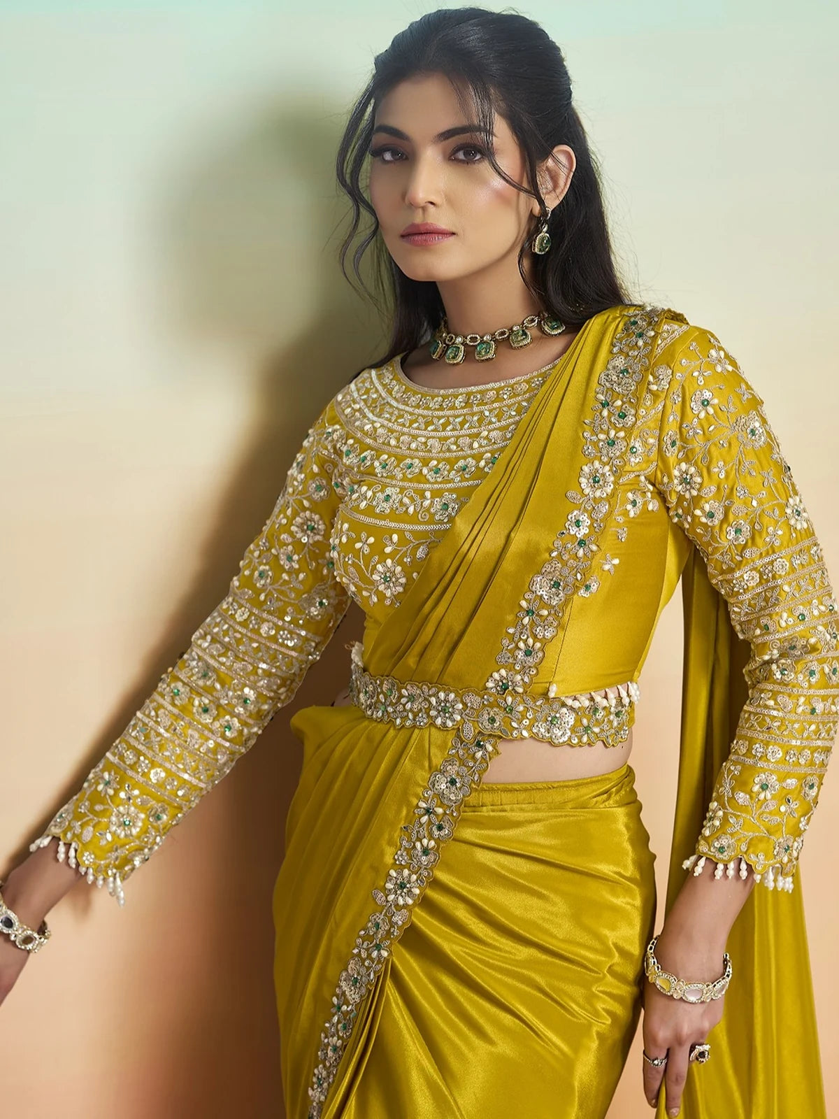 Tarani Aishika mustard saree blouse view with sequin embroidery stones pearls and mirror work