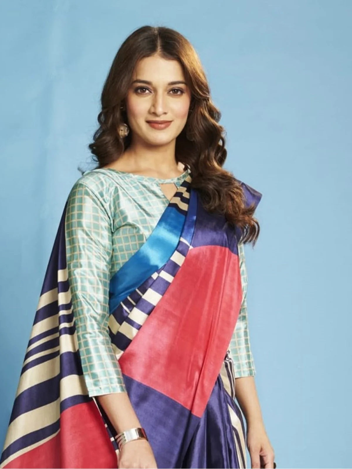 Tarani blue crepe silk saree upper body close-up with red and check blouse styling