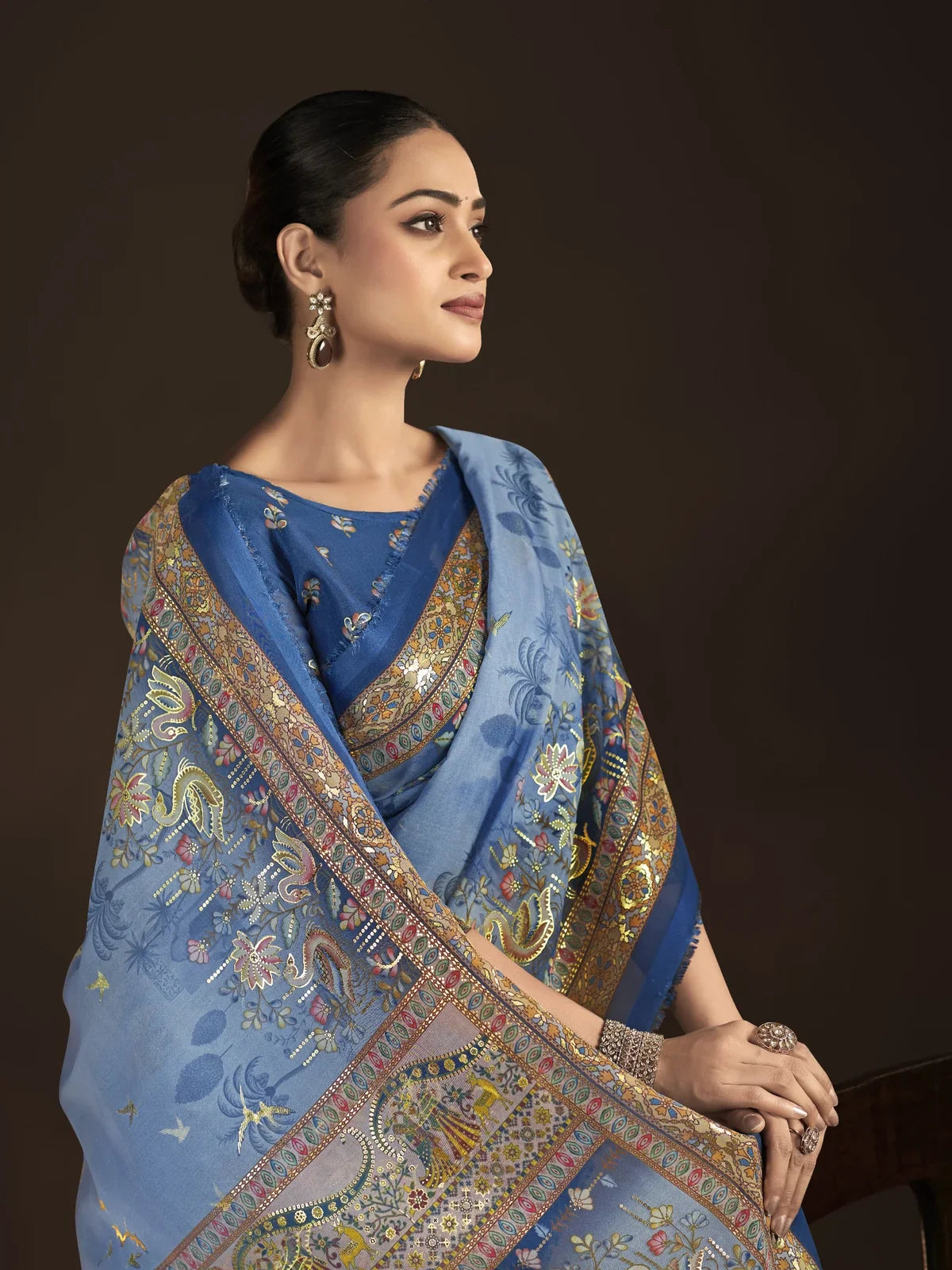Tarani elegant crepe silk saree in blue shade with detailed blouse design upper body view