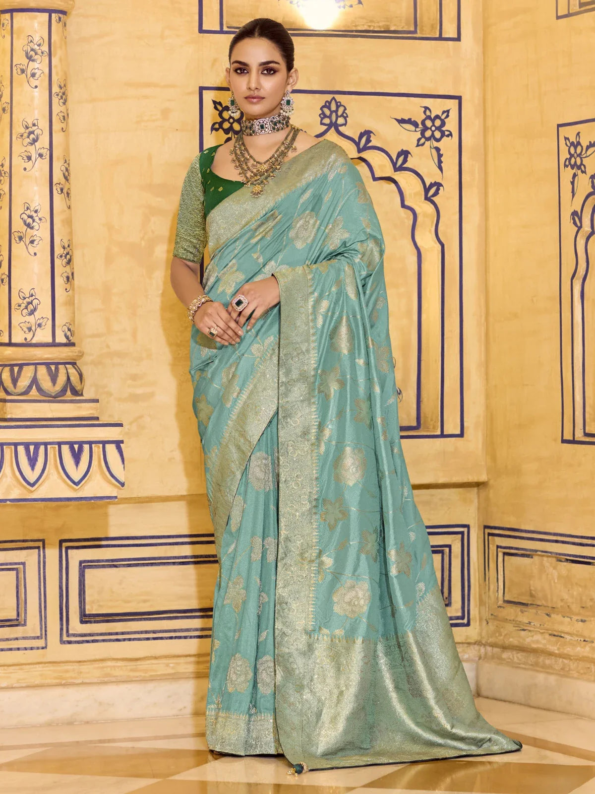 Tarani premium green crepe silk saree full view with zari weaving and elegant drape